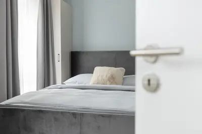Ein Bett oder Betten in einem Zimmer der Unterkunft Sturmfrei Suite 7