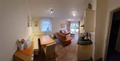 Ein Sitzbereich in der Unterkunft Moderne Kurparkresidenz