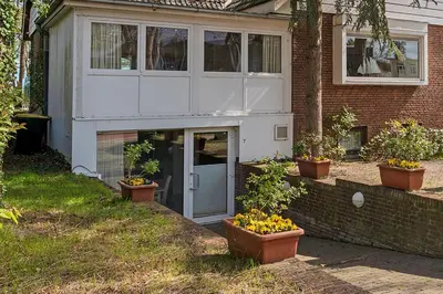 Ein Garten an der Unterkunft Haus Eva Mar am Meer Appartement 2