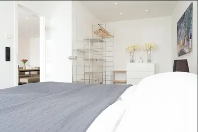 Ein Bett oder Betten in einem Zimmer der Unterkunft Strandvilla Augustusbad Meerverliebt