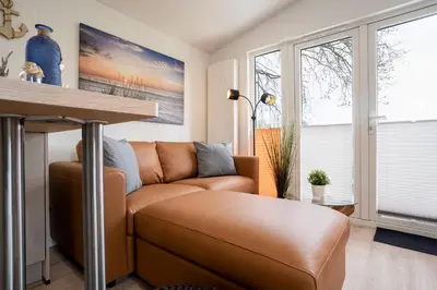 Ein Sitzbereich in der Unterkunft Ostseecamp Ferienhaus 