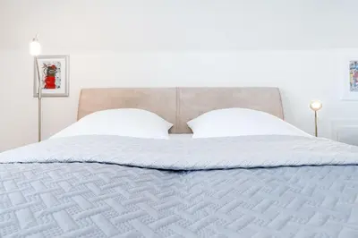 Ein Bett oder Betten in einem Zimmer der Unterkunft Haus Eva Mar am Meer Appartement 4