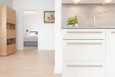 Ein Bett oder Betten in einem Zimmer der Unterkunft Priwalk Vacation