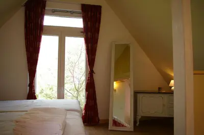 Ein Bett oder Betten in einem Zimmer der Unterkunft Kaiserhof Goldenbek
