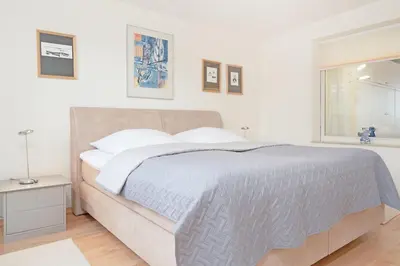 Ein Bett oder Betten in einem Zimmer der Unterkunft Haus Eva Mar am Meer Appartement 1