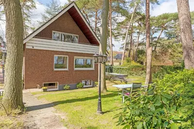 Ein Garten an der Unterkunft Haus Eva Mar am Meer Appartement 1