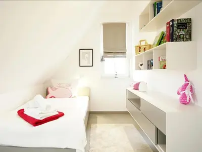 Ein Bett oder Betten in einem Zimmer der Unterkunft Roter Milan