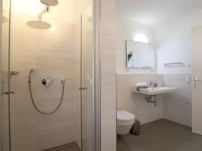 Ein Badezimmer in der Unterkunft Kapitänshaus