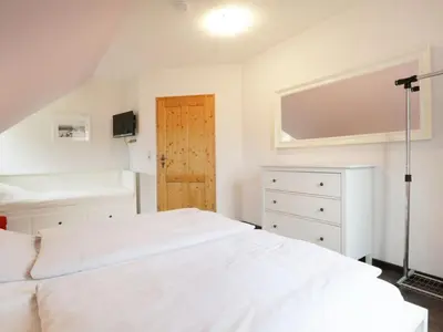 Ein Bett oder Betten in einem Zimmer der Unterkunft Sonnenblick Ferienhaus