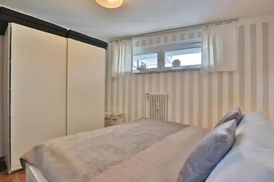 Ein Bett oder Betten in einem Zimmer der Unterkunft Haus Bergstraße 35 Appartement 16