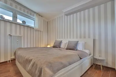 Ein Bett oder Betten in einem Zimmer der Unterkunft Haus Bergstraße 35 Appartement 16
