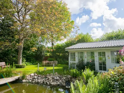 Ein Garten an der Unterkunft Lieblingsort Leichtigkeit