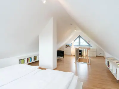 Ein Bett oder Betten in einem Zimmer der Unterkunft Strandlust