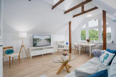 Ein Sitzbereich in der Unterkunft KUR18 Ferienwohnung Baltic Deck