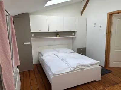 Ein Bett oder Betten in einem Zimmer der Unterkunft Urlaub in Einer Historischen Wassermühle an der Trave