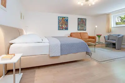 Ein Bett oder Betten in einem Zimmer der Unterkunft Haus Eva Mar am Meer Appartement 6
