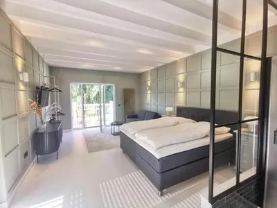 Ein Bett oder Betten in einem Zimmer der Unterkunft Tiny Loft Obj 37 2-4 Personen strandnah WLAN