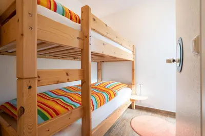 Ein Bett oder Betten in einem Zimmer der Unterkunft Seesand Nr 3