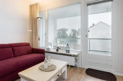 Ein Sitzbereich in der Unterkunft Ferienwohnung Meeresstrand, App 304