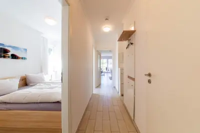 Ein Bett oder Betten in einem Zimmer der Unterkunft Ferienwohnung Strandleben