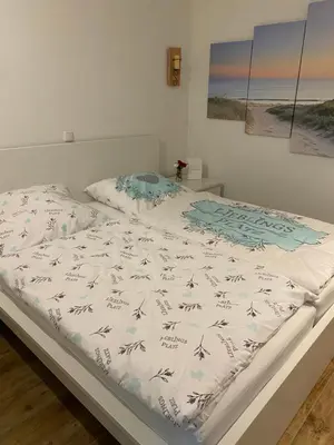Ein Bett oder Betten in einem Zimmer der Unterkunft Ferienwohnung Lieblingsplatz, Urlaub und Meer!