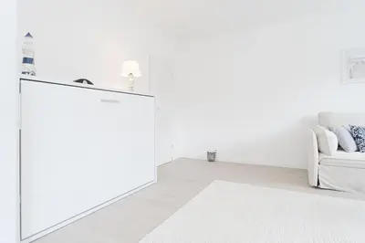 Ein Bett oder Betten in einem Zimmer der Unterkunft Seestraße 24 Meeresglück