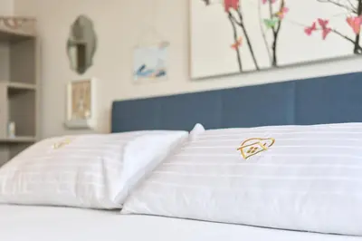 Ein Bett oder Betten in einem Zimmer der Unterkunft Strandperle Apartment 7