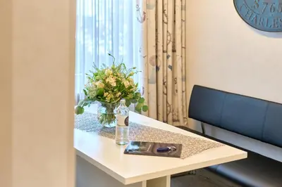 Ein Sitzbereich in der Unterkunft Strandperle Apartment 7