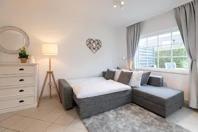 Ein Bett oder Betten in einem Zimmer der Unterkunft Meeresliebling
