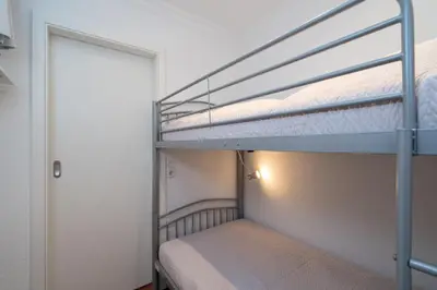 Ein Bett oder Betten in einem Zimmer der Unterkunft Ferienpark Sierksdorf App 25 - Strandlage