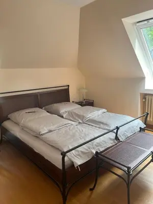 Ein Bett oder Betten in einem Zimmer der Unterkunft Dünenhaus 2 Schlafzimmer