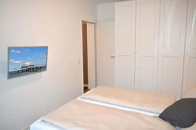 Ein Bett oder Betten in einem Zimmer der Unterkunft Bett u Butze Timmendorfer Strand Ferienwohnung