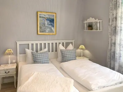 Ein Bett oder Betten in einem Zimmer der Unterkunft Villa Svanen am Meer