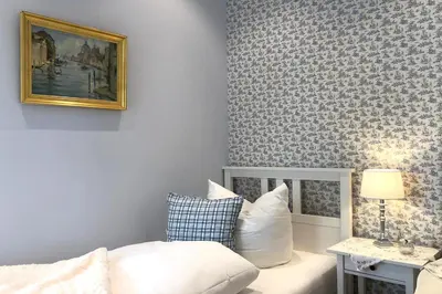 Ein Bett oder Betten in einem Zimmer der Unterkunft Villa Svanen am Meer