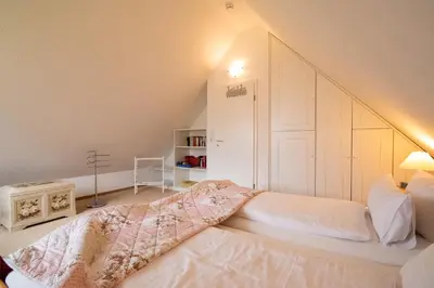 Ein Bett oder Betten in einem Zimmer der Unterkunft Drosselweg 4 Apartment 4