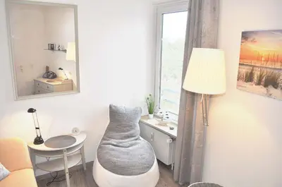 Ein Sitzbereich in der Unterkunft Carpe Diem Ferienwohnung Nr 187 Meerblick