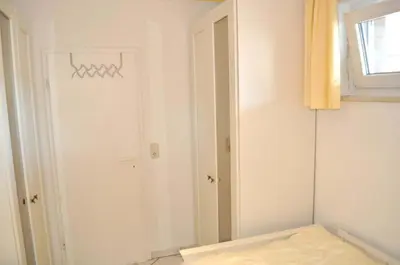 Ein Bett oder Betten in einem Zimmer der Unterkunft Domizil Royal Ferienwohnung Nr 22