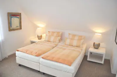 Ein Bett oder Betten in einem Zimmer der Unterkunft Gästehaus Steinhardt Appartement Nr 04