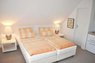 Ein Bett oder Betten in einem Zimmer der Unterkunft Gästehaus Steinhardt Appartement Nr 04
