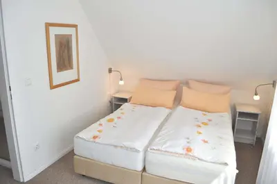 Ein Bett oder Betten in einem Zimmer der Unterkunft Gästehaus Steinhardt Appartement Nr 05