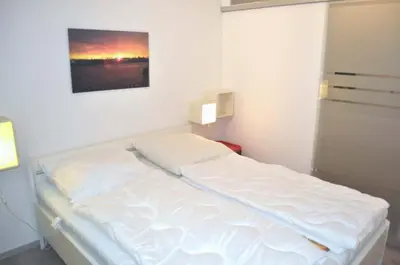 Ein Bett oder Betten in einem Zimmer der Unterkunft Haus Adria Ferienwohnung Nr 06