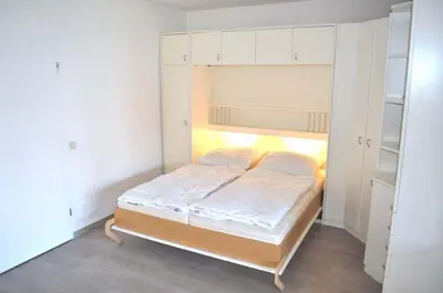 Ein Bett oder Betten in einem Zimmer der Unterkunft Haus Dorothea Ferienwohnung Nr 02
