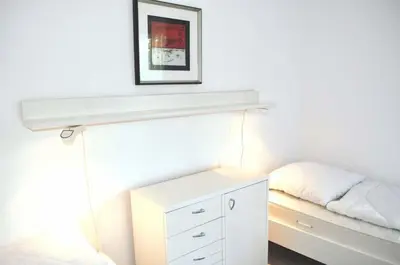 Ein Bett oder Betten in einem Zimmer der Unterkunft Haus Dorothea Ferienwohnung Nr 02