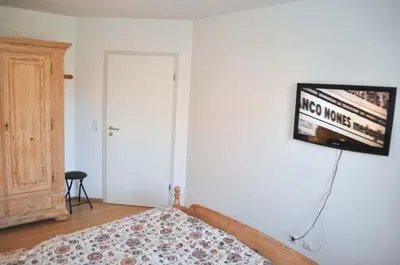 Ein Bett oder Betten in einem Zimmer der Unterkunft Ostseeallee 10 Ferienwohnung Nr 02