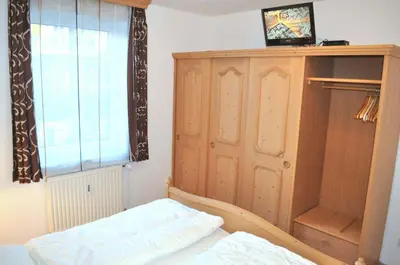 Ein Bett oder Betten in einem Zimmer der Unterkunft Ostseeallee 11 Ferienwohnung Nr 03