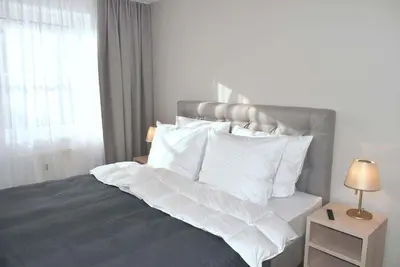 Ein Bett oder Betten in einem Zimmer der Unterkunft Ostseeallee 4 Ferienwohnung Nr 21 Salz & Meer