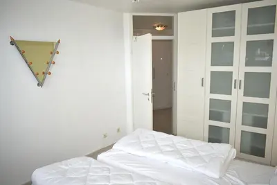 Ein Bett oder Betten in einem Zimmer der Unterkunft Residenz Niendorf Ferienwohnung Nr 33