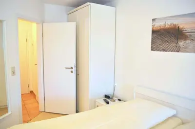 Ein Bett oder Betten in einem Zimmer der Unterkunft Residenz Ostseestrand Ferienwohnung Nr 09