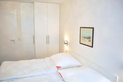 Ein Bett oder Betten in einem Zimmer der Unterkunft Residenz Ostseestrand Ferienwohnung Nr 21 Meerblick