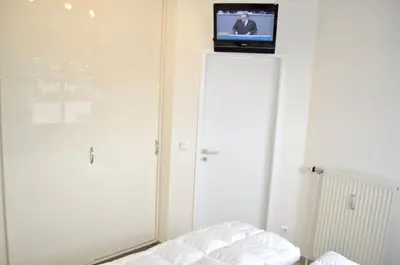 Ein Bett oder Betten in einem Zimmer der Unterkunft Strandhotel Ferienwohnung Nr 10